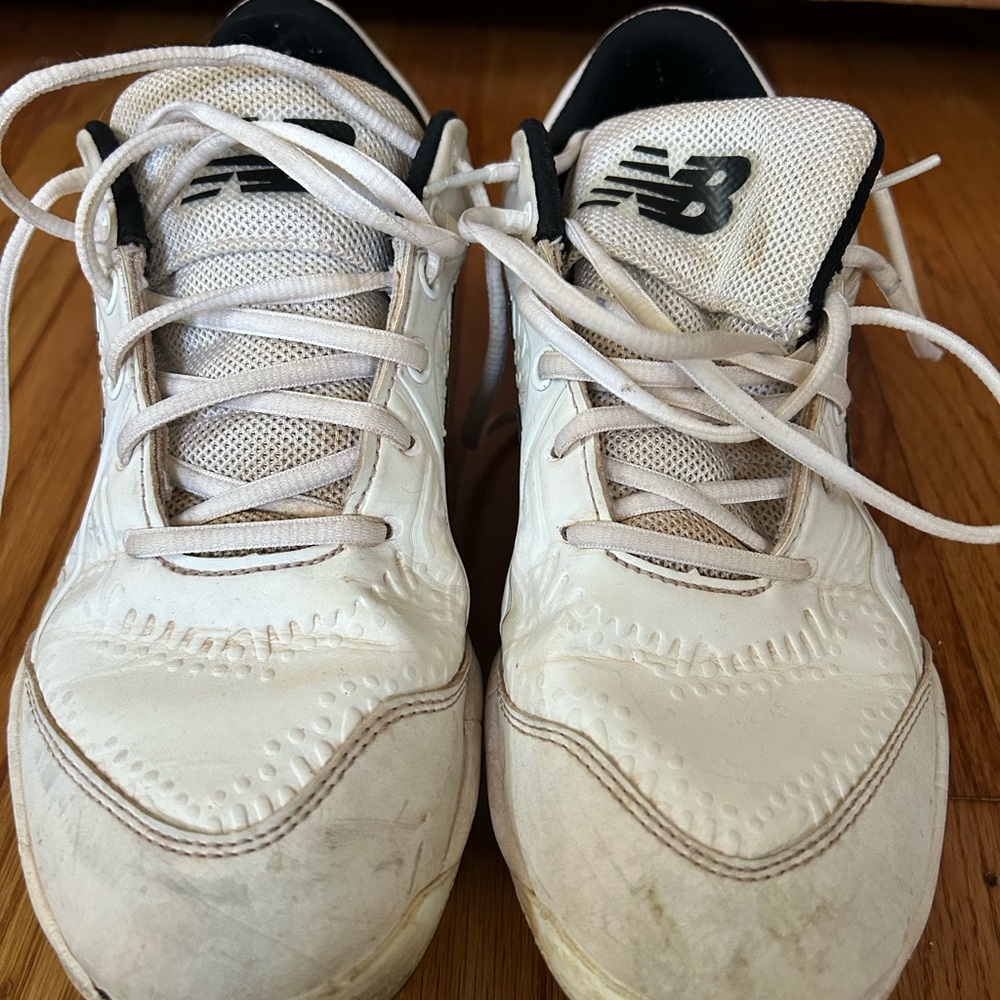 New Balance metal cleats